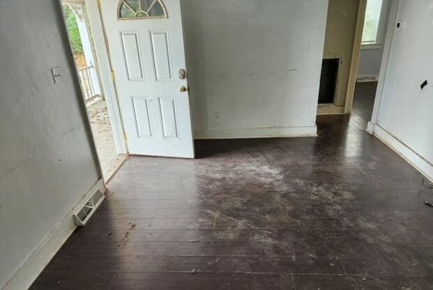 entrance foyer featuring dark wood-type flooring