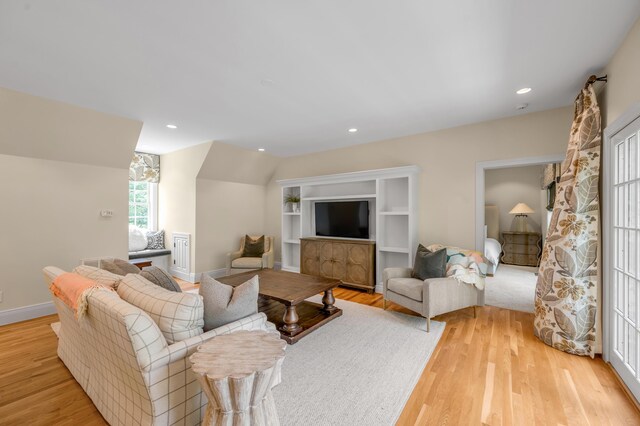 1821 Delong Rd, Lexington, KY 40515 - living area with light wood finished floors, recessed lighting, and baseboards