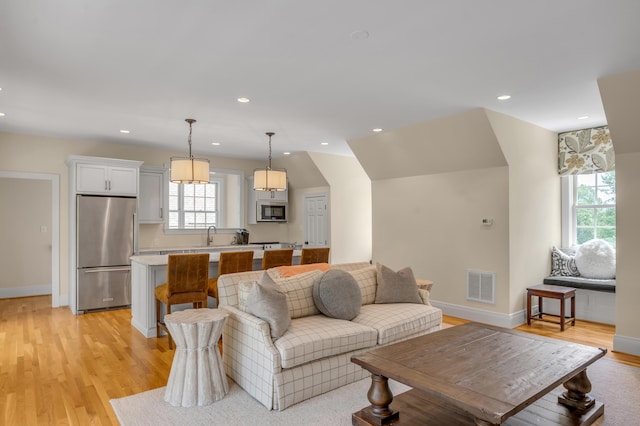 1821 Delong Rd, Lexington, KY 40515 - living room with baseboards, visible vents, light wood-style floors, and recessed lighting