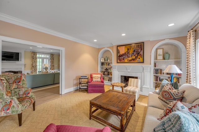 1821 Delong Rd, Lexington, KY 40515 - living area featuring recessed lighting, a fireplace, built in shelves, crown molding, and baseboards