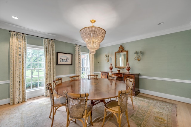 1821 Delong Rd, Lexington, KY 40515 - dining room featuring crown molding, a notable chandelier, wood finished floors, and baseboards
