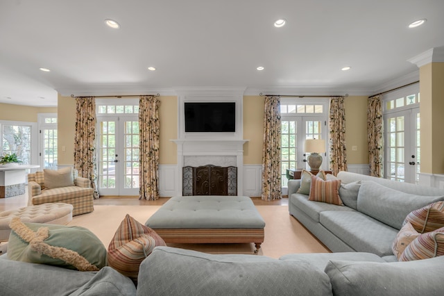 1821 Delong Rd, Lexington, KY 40515 - living area featuring recessed lighting, a decorative wall, wainscoting, french doors, and crown molding
