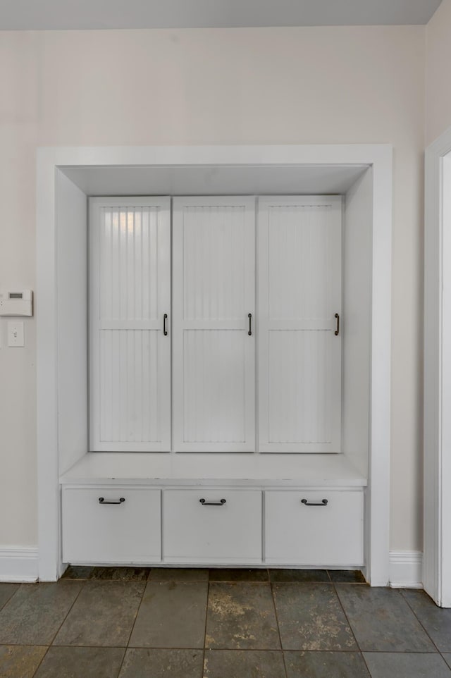 1821 Delong Rd, Lexington, KY 40515 - mudroom featuring stone finish flooring and baseboards