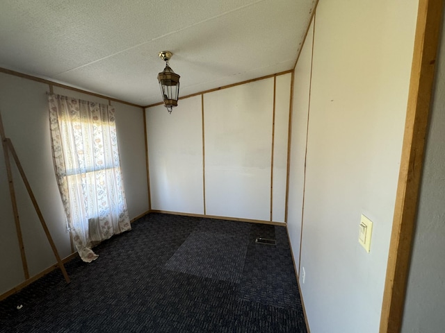 empty room featuring carpet floors