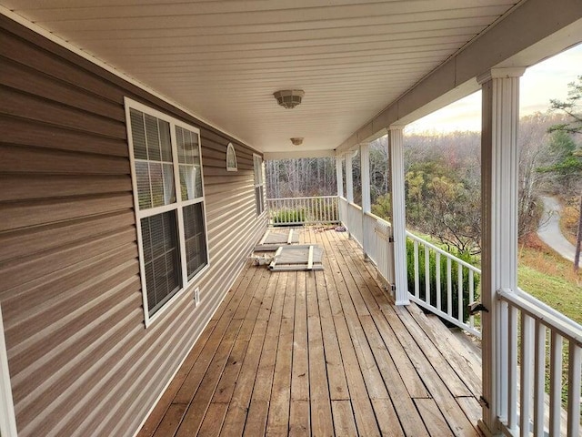 deck featuring covered porch