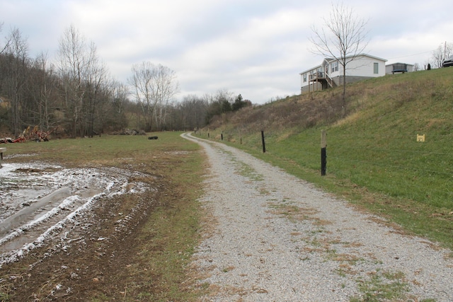 view of road with a rural view