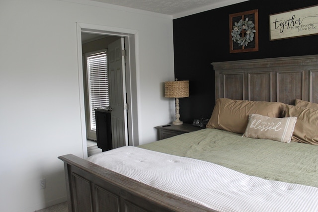 bedroom featuring a textured ceiling