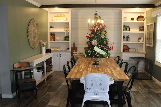 dining space featuring beam ceiling, crown molding, dark hardwood / wood-style flooring, and an inviting chandelier