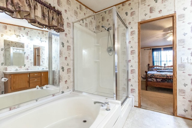 bathroom with ceiling fan, plus walk in shower, tile patterned flooring, a textured ceiling, and vanity