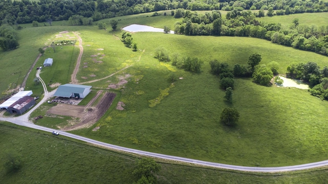 birds eye view of property featuring a rural view