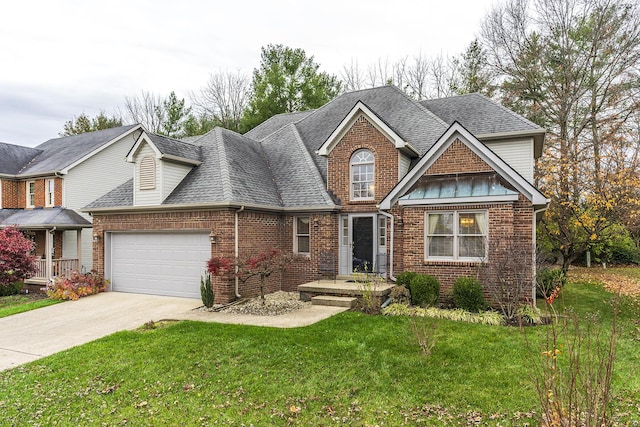 view of front facade featuring a garage and a front lawn