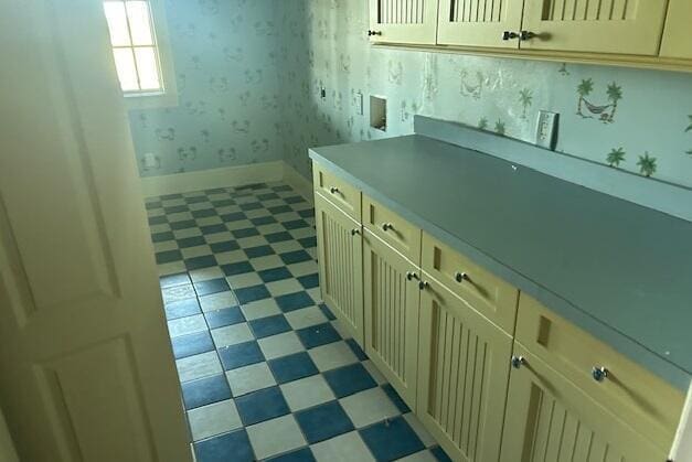 kitchen featuring cream cabinetry