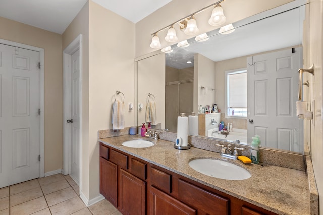 bathroom featuring tile patterned flooring, vanity, and plus walk in shower