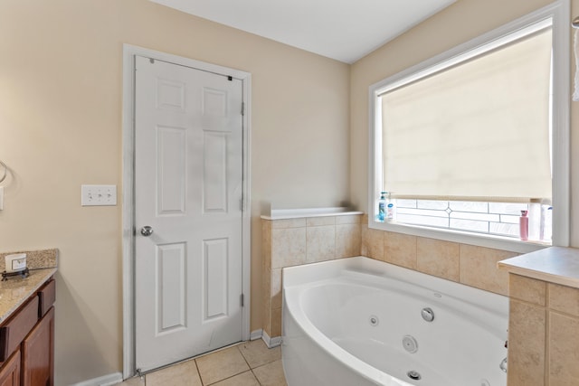 bathroom with tile patterned floors and a washtub