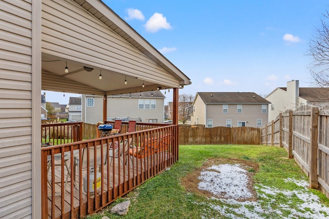 view of yard featuring a wooden deck