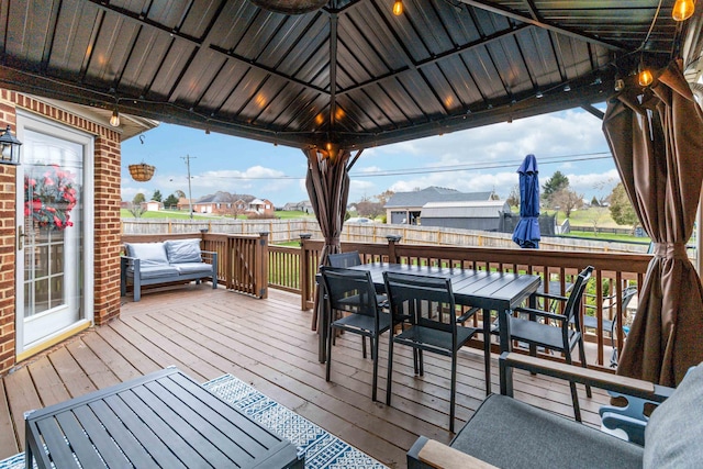 wooden terrace with a gazebo