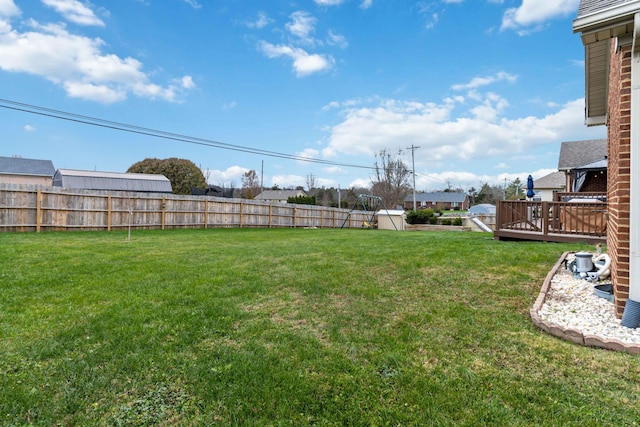 view of yard featuring a deck