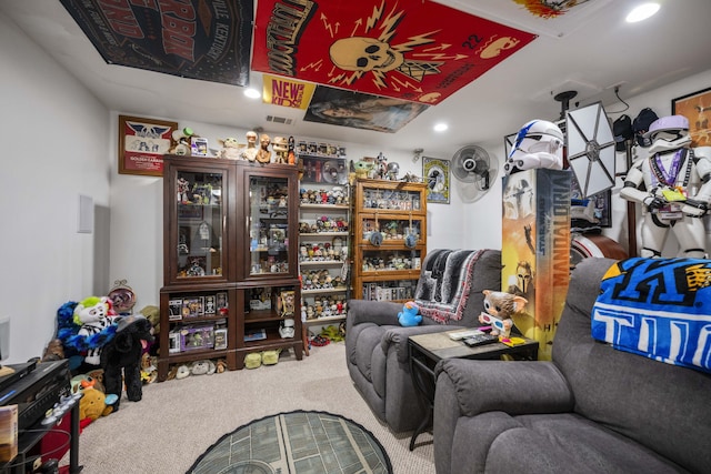 living area featuring recessed lighting and carpet flooring