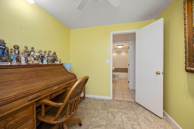 home office with baseboards, a ceiling fan, and light tile patterned flooring