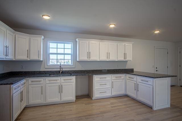 kitchen with white cabinets