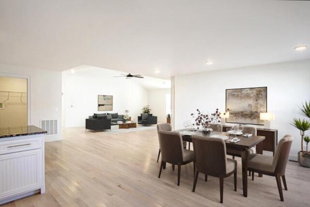 dining area featuring ceiling fan and light hardwood / wood-style floors