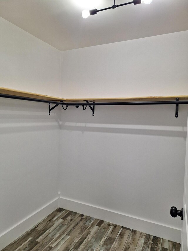 bathroom with vanity and hardwood / wood-style flooring