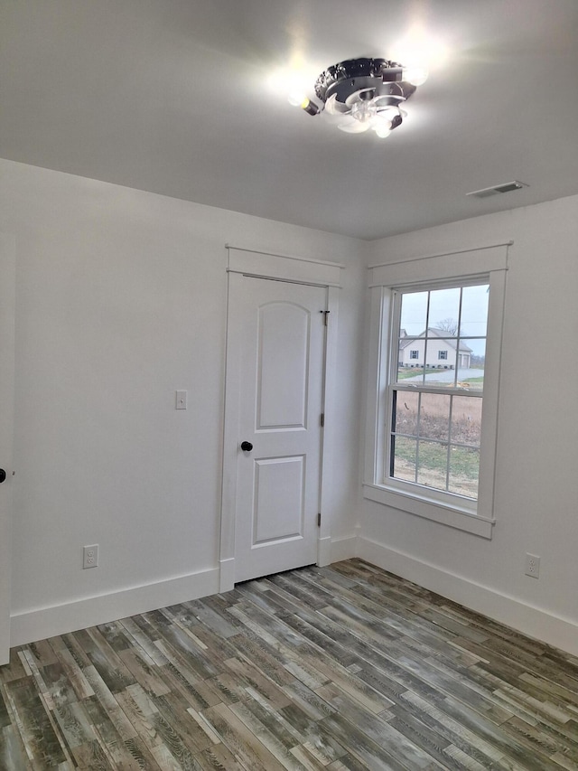 15 David St, Flemingsburg, KY 41041 - spare room featuring dark wood-type flooring and baseboards