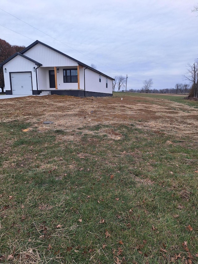 15 David St, Flemingsburg, KY 41041 - view of front of property featuring a garage