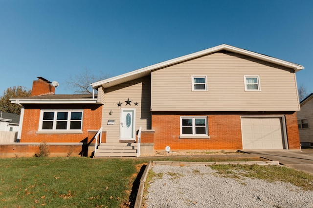 view of front facade featuring a garage and a front yard