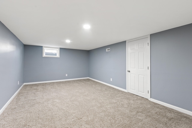 basement featuring carpet flooring