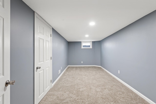 basement featuring carpet flooring