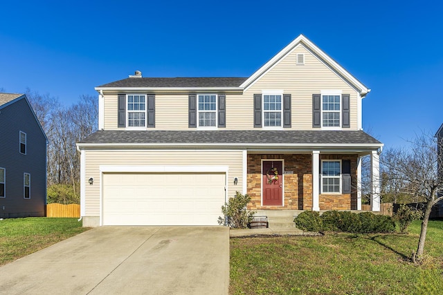 front facade with a garage and a front lawn