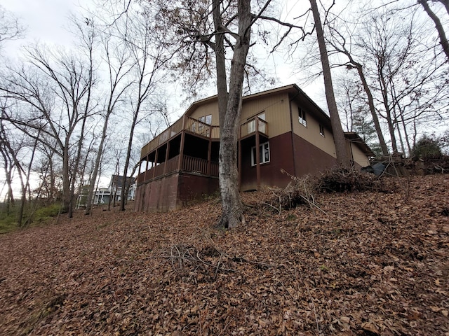 view of property exterior featuring a balcony