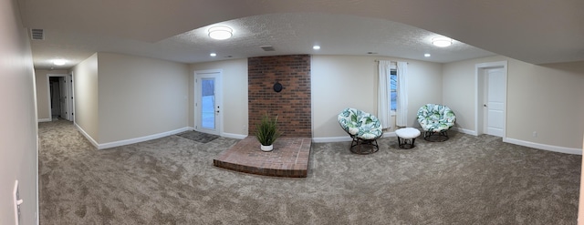 interior space with a textured ceiling