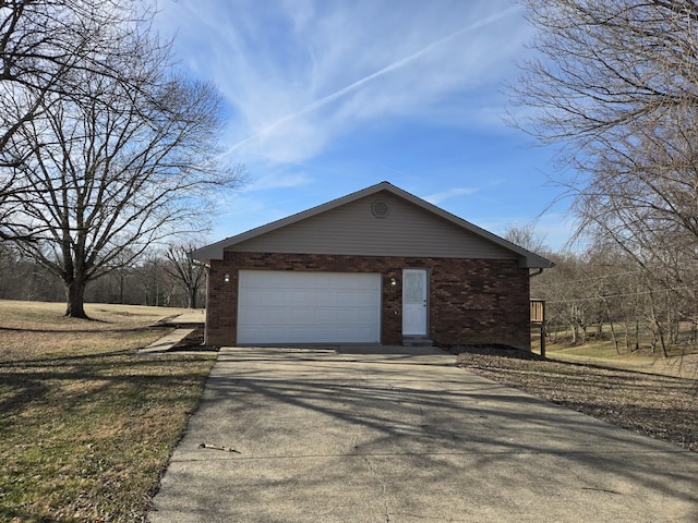 view of property exterior with a garage and an outdoor structure