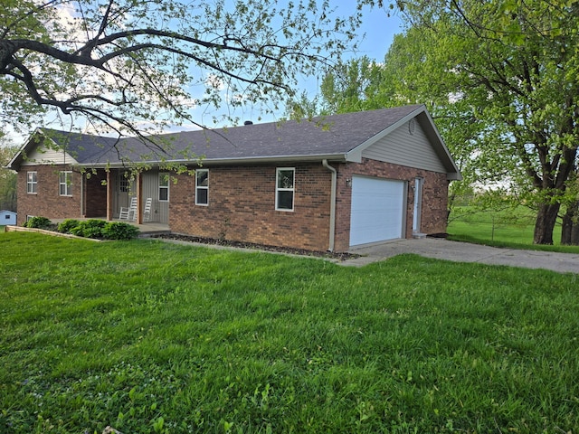 18 Ash Dr, Nancy, KY 42544 - view of front of home with driveway, brick siding, a front yard, an attached garage, and a shingled roof