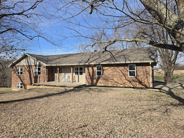 view of front of property featuring a patio area