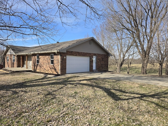 view of home's exterior with a garage and a lawn