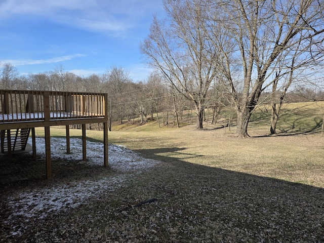 view of yard with a wooden deck