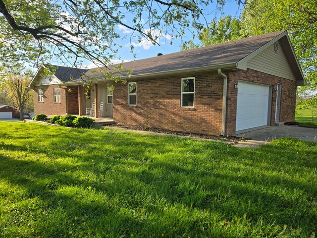 18 Ash Dr, Nancy, KY 42544 - ranch-style home with brick siding, driveway, and a front yard