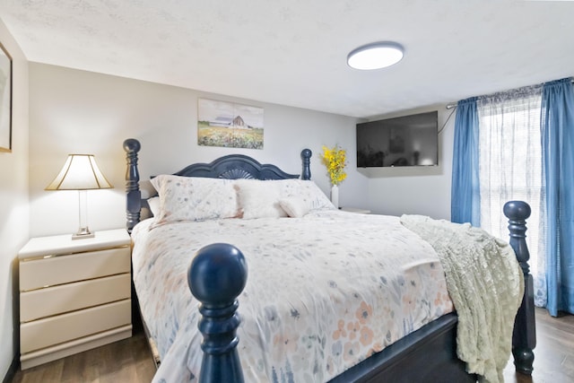 bedroom featuring hardwood / wood-style floors