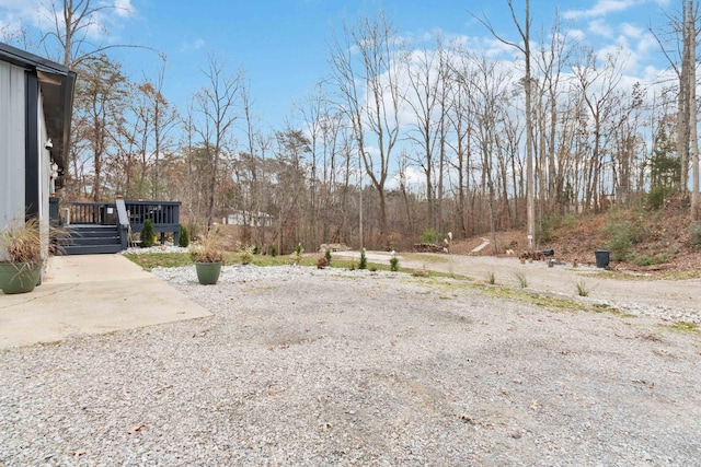 view of yard featuring a deck