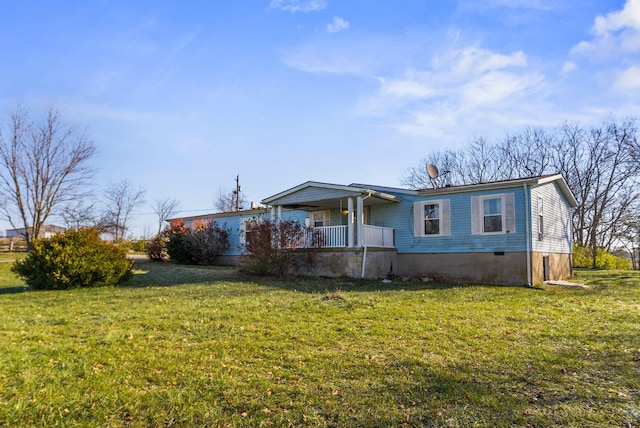 view of front of home with a porch and a front yard