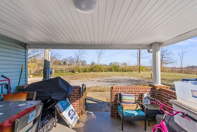 view of patio with a grill