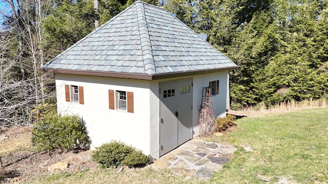 exterior space with an outbuilding and a gazebo