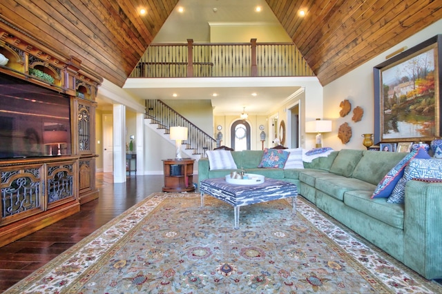 living area featuring high vaulted ceiling, wooden ceiling, wood finished floors, stairs, and crown molding