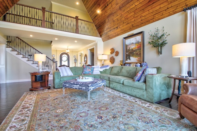 living area featuring high vaulted ceiling, wooden ceiling, wood finished floors, baseboards, and stairs