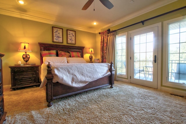 carpeted bedroom with access to outside, multiple windows, and crown molding