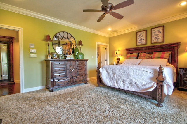 bedroom featuring carpet floors, ornamental molding, and baseboards