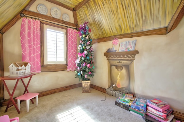 playroom featuring carpet floors and baseboards